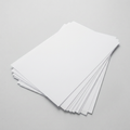 White curing paper with a matching light-gray studio background